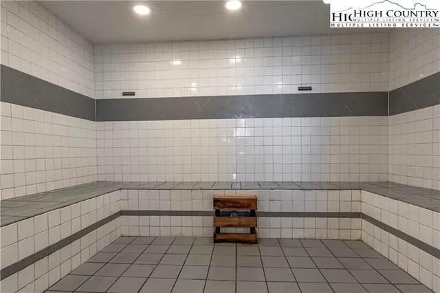 a bathroom with a sink and a window
