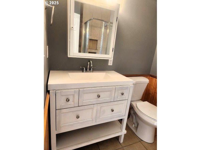 1335 Childers Road Arlington, OR 97812 - Photo 16 of 25 a bathroom with a sink and a vanity