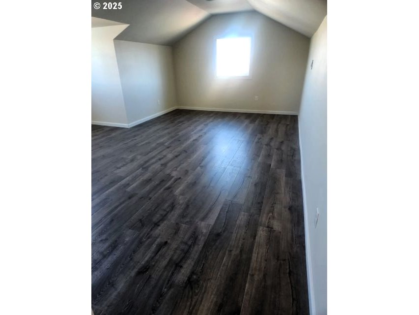 1335 Childers Road Arlington, OR 97812 - Photo 24 of 25 a view of wooden floor and windows in a room