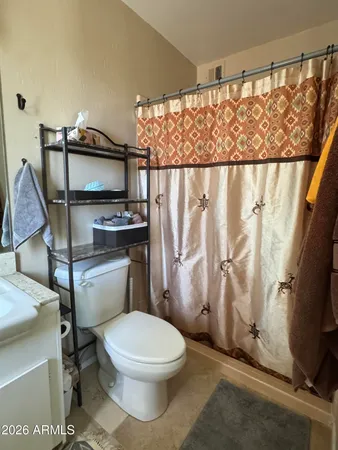 a view of a house with sitting area and garden