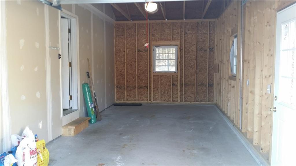 128 Ridley Road Springvale, ME 04083 - Photo 2 of 15 The attached 1 car garage. Come on in