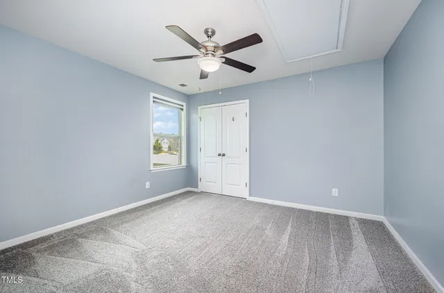 a bathroom with a sink double vanity and a mirror