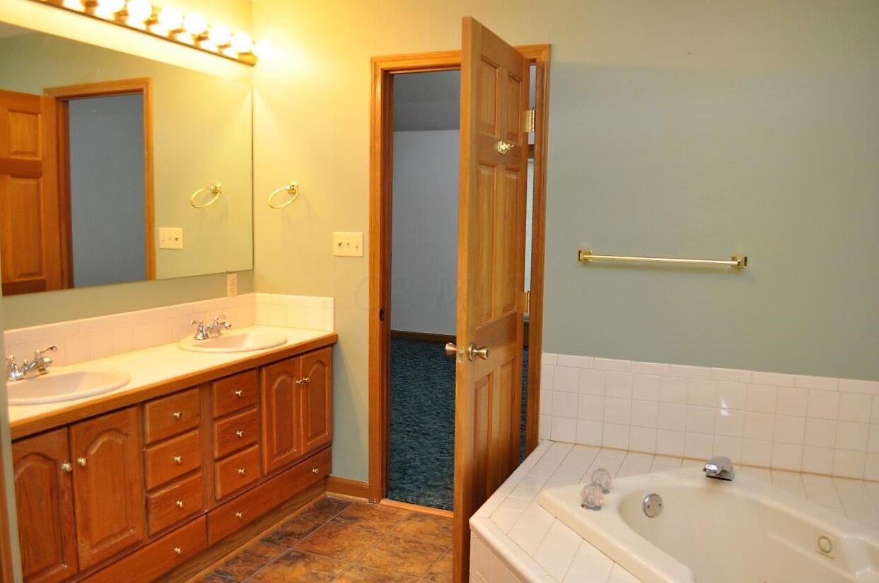 271 Holder Road Baltimore, OH 43105 - Photo 23 of 66 1st Floor Owner Suite Private Bath - 271 Holder Road NW, Baltimore, OH 43105