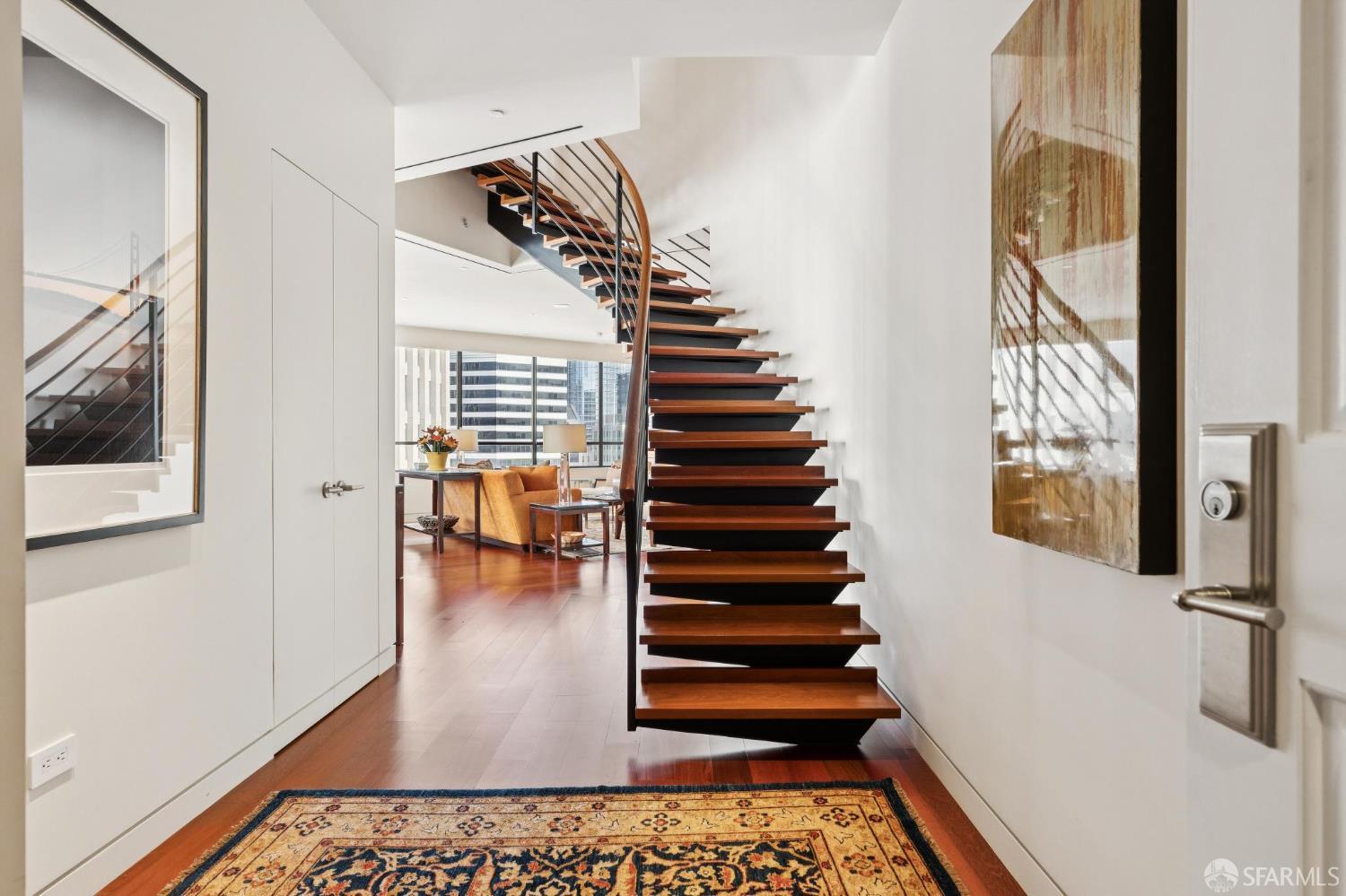 690 Market Street, Unit 2404 San Francisco, CA 94104 - Photo 2 of 36 a view of entryway and hall with wooden floor