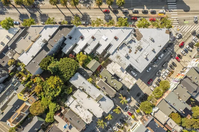 an outdoor space with lots of trees