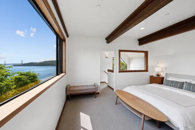 a kitchen with stainless steel appliances granite countertop a sink and a microwave