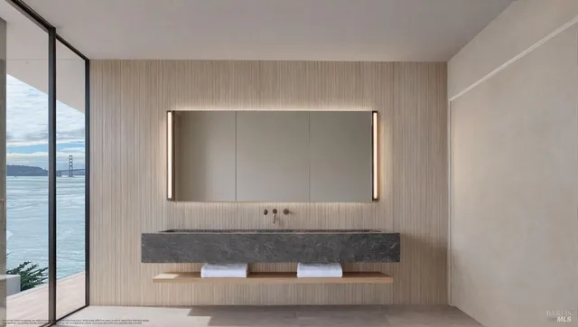 a bathroom with a bathtub and mirror