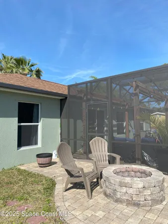 a view of a patio with a chair