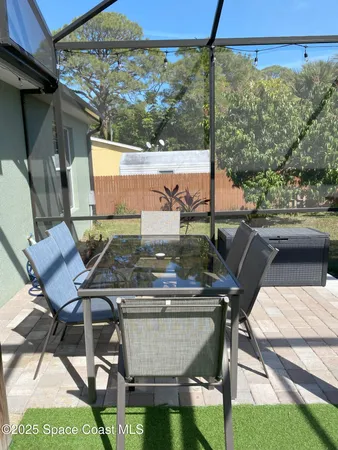 a view of an outdoor sitting area with a lake view