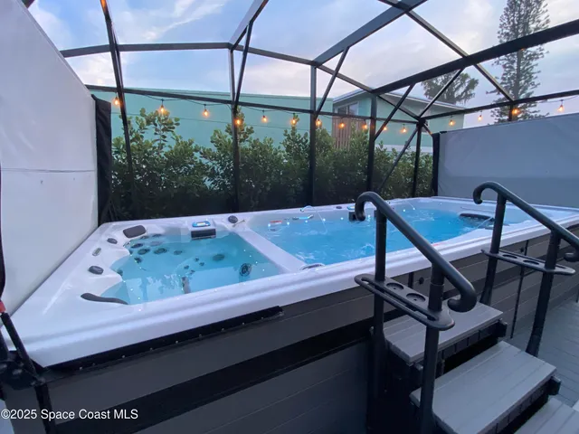 a view of a backyard of the house