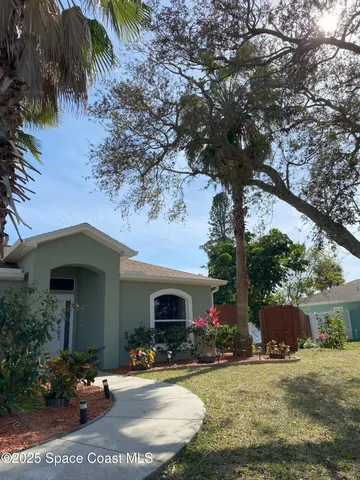 a view of a house with a patio