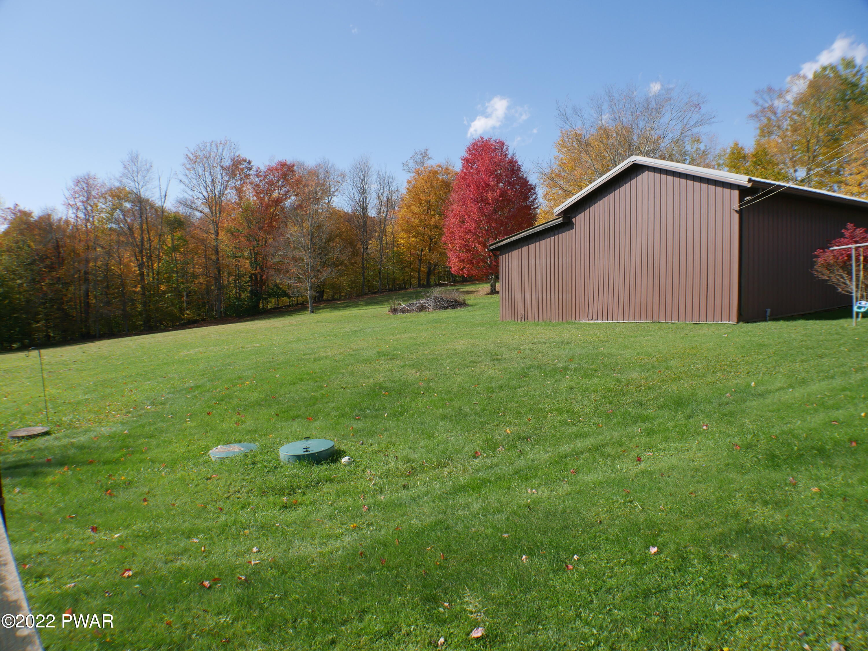 1259 Dougherty Road Meshoppen, PA 18630 - Photo 33 of 61 a backyard of a house with lots of green space