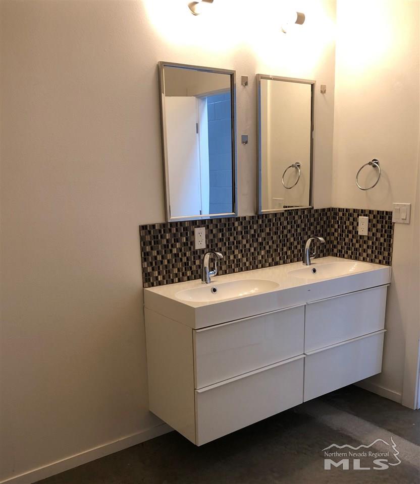 339 South Wells Avenue Reno, NV 89502 - Photo 11 of 20 a bathroom with a sink and a mirror