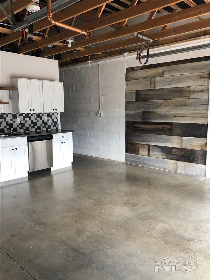 339 South Wells Avenue Reno, NV 89502 - Photo 15 of 20 a kitchen with a stove and white cabinets