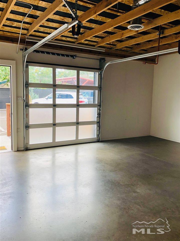 339 South Wells Avenue Reno, NV 89502 - Photo 18 of 20 a view of a room with wooden walls and a window