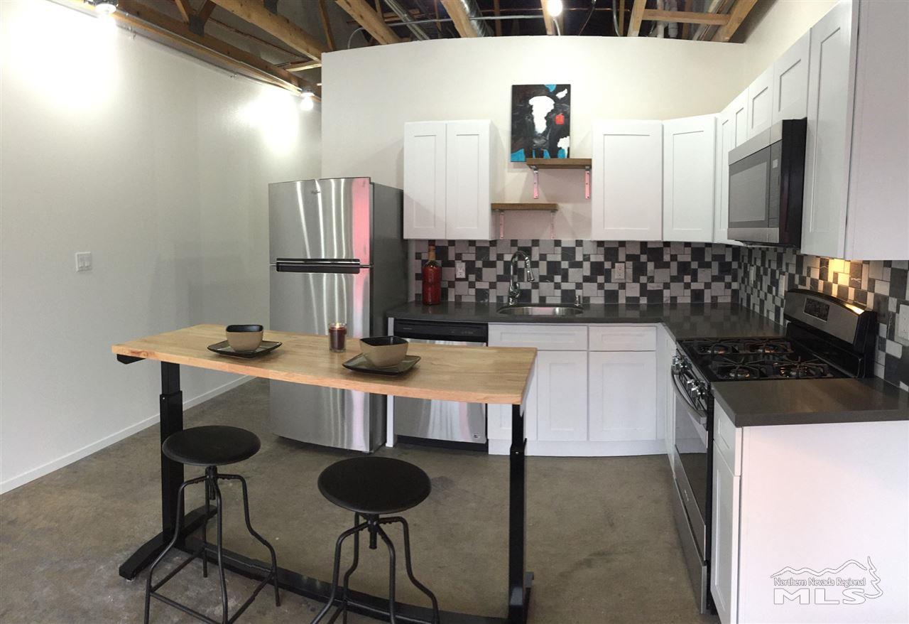 339 South Wells Avenue Reno, NV 89502 - Photo 5 of 20 a kitchen with a table and chairs in it