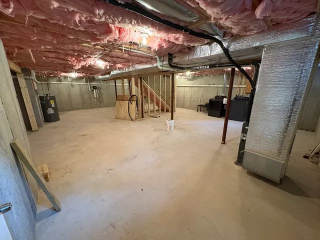 a view of a garage with wooden floor