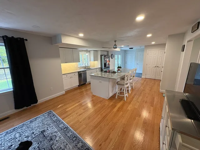 a view of a kitchen and dining room