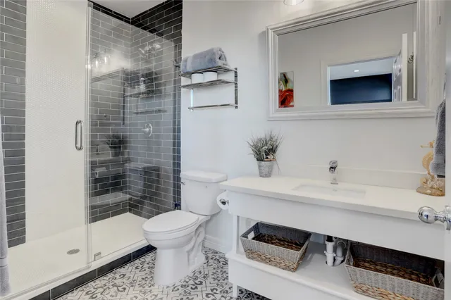 a kitchen with stainless steel appliances a sink and a stove