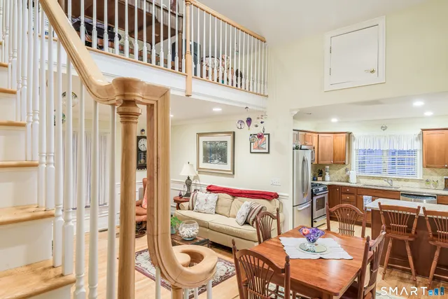 a view of a hallway with seating space