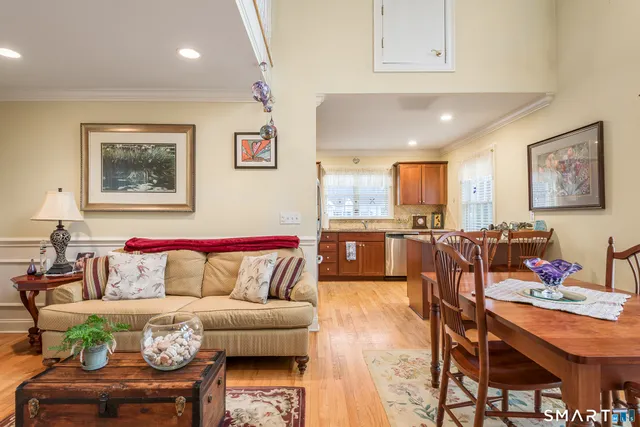 a living room with furniture and a rug