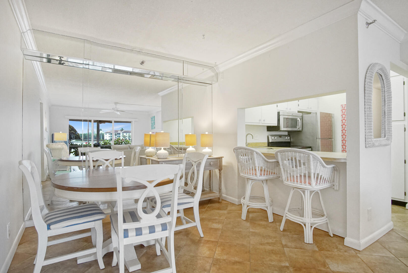 4428 Northeast Ocean Boulevard, Unit G1 Jensen Beach, FL 34957 - Photo 11 of 28 a view of a dining room with furniture