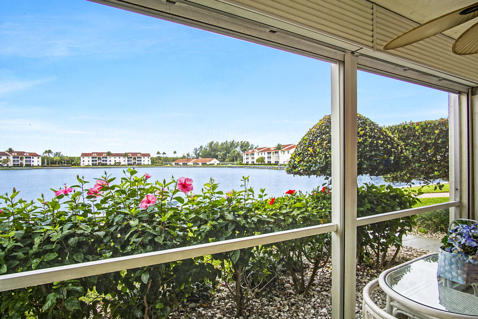 4428 Northeast Ocean Boulevard, Unit G1 Jensen Beach, FL 34957 - Photo 2 of 28 a view of a balcony with flower plants