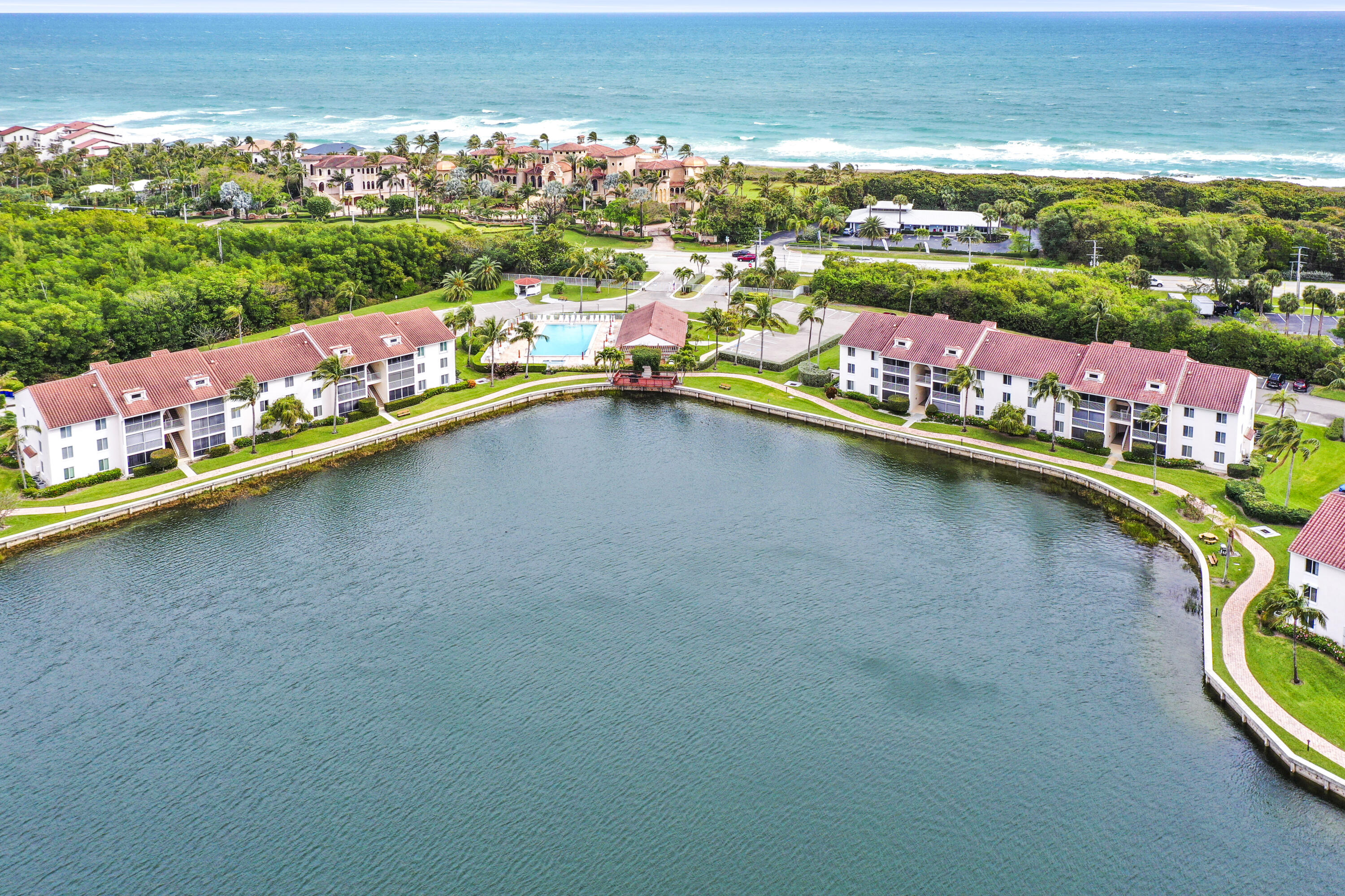 4428 Northeast Ocean Boulevard, Unit G1 Jensen Beach, FL 34957 - Photo 24 of 28 a view of a city with a lake view