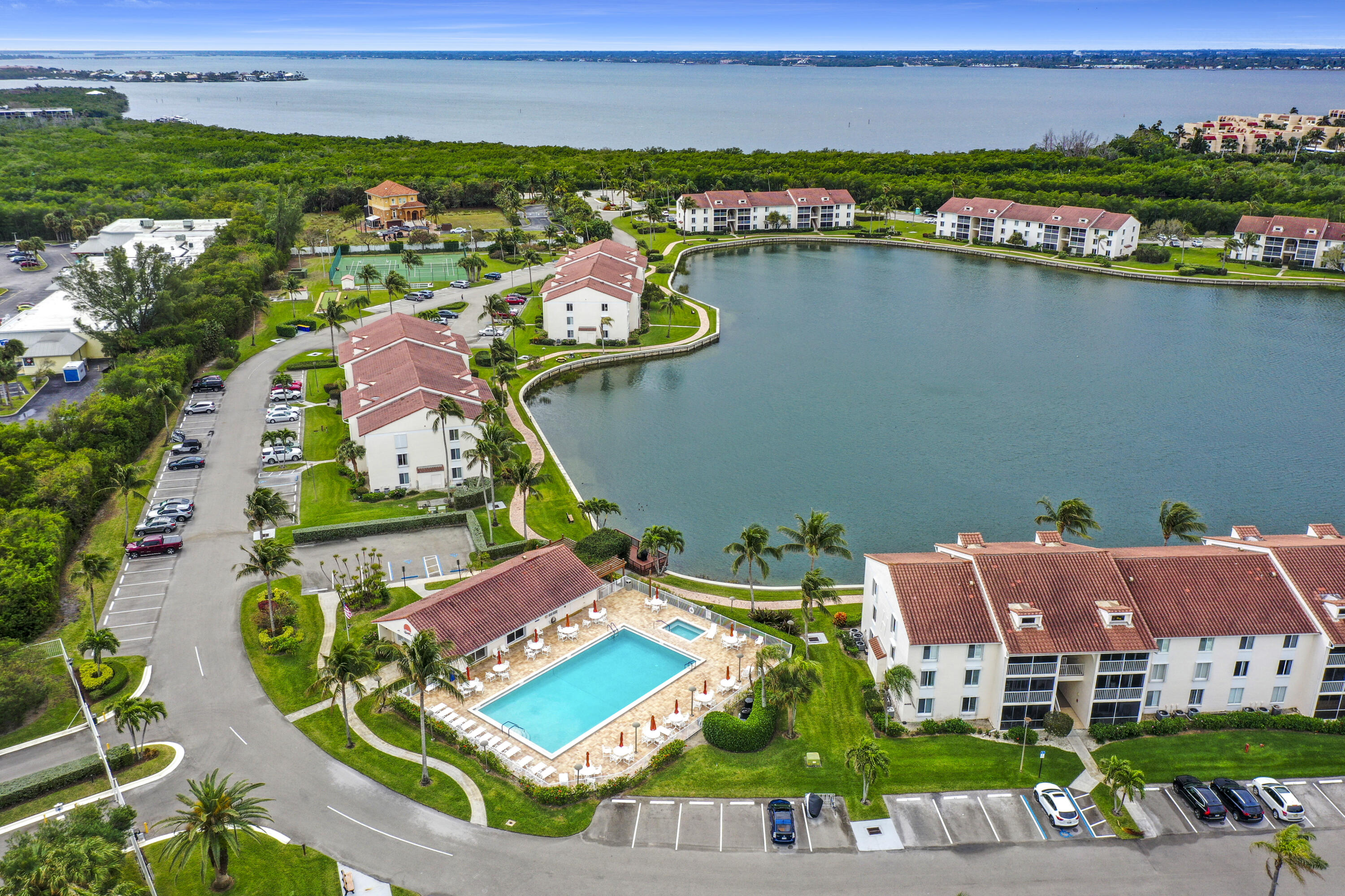 4428 Northeast Ocean Boulevard, Unit G1 Jensen Beach, FL 34957 - Photo 27 of 28 an aerial view of a house with a lake view