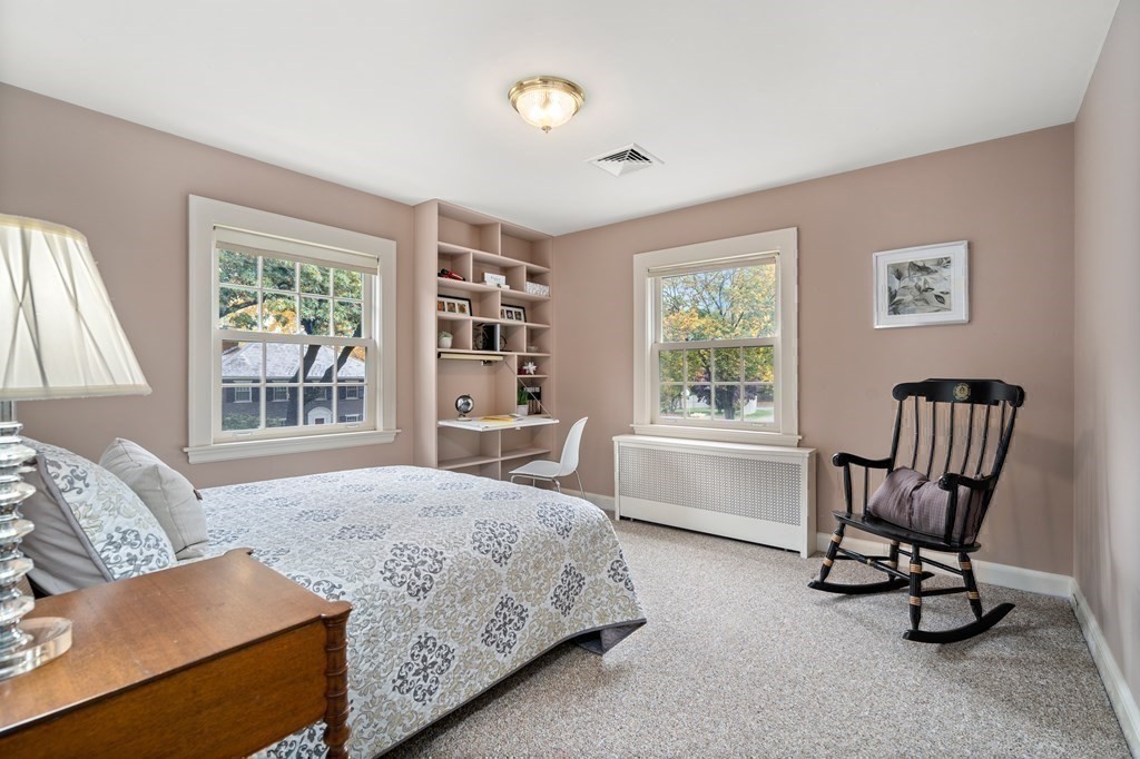 243 Rutledge Road Belmont, MA 02478 - Photo 16 of 21 a bedroom with a bed chair and window