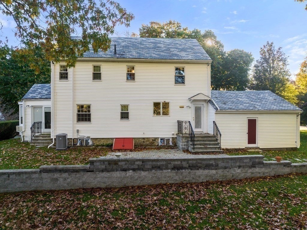 243 Rutledge Road Belmont, MA 02478 - Photo 19 of 21 a front view of a house with a yard