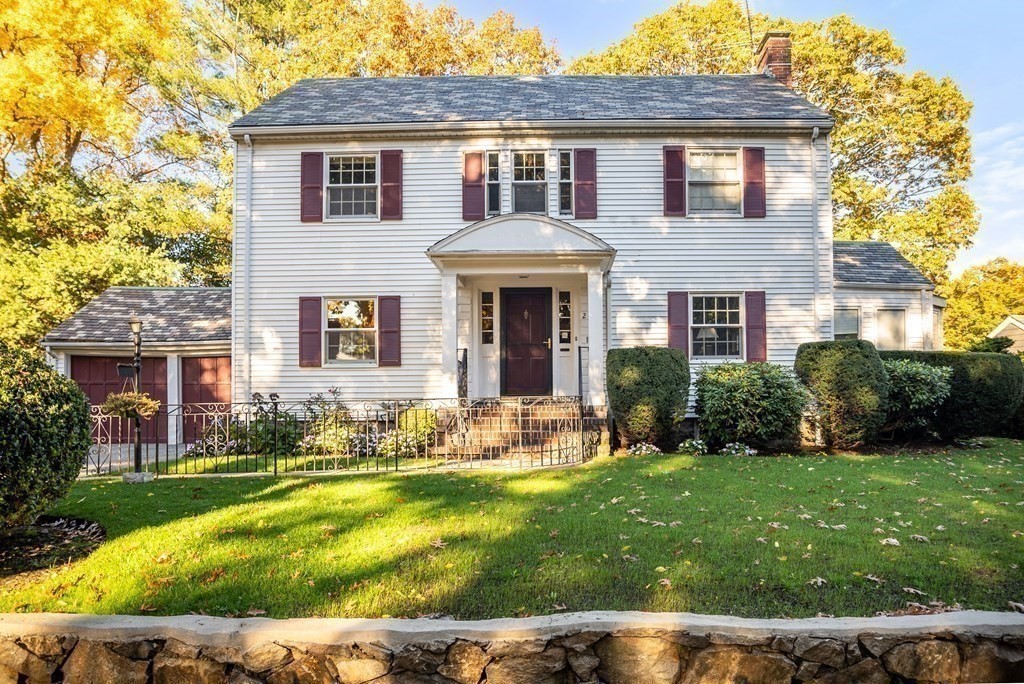 243 Rutledge Road Belmont, MA 02478 - Photo 2 of 21 a front view of a house with garden and porch