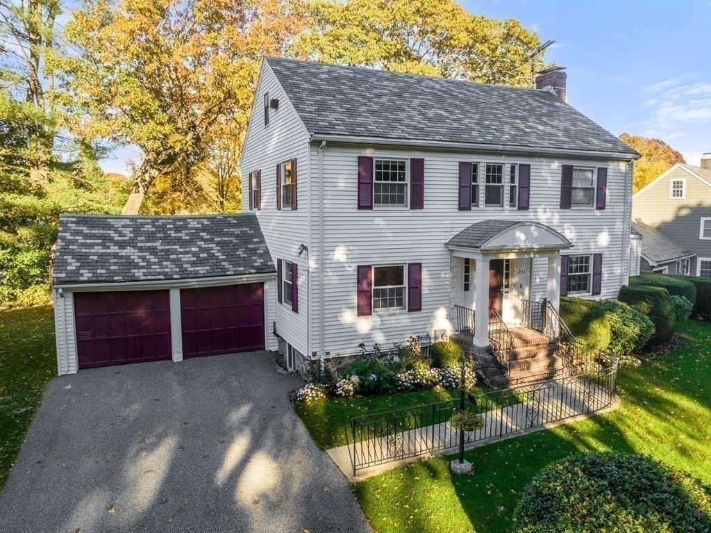 243 Rutledge Road Belmont, MA 02478 - Photo 3 of 21 a front view of a house with garden