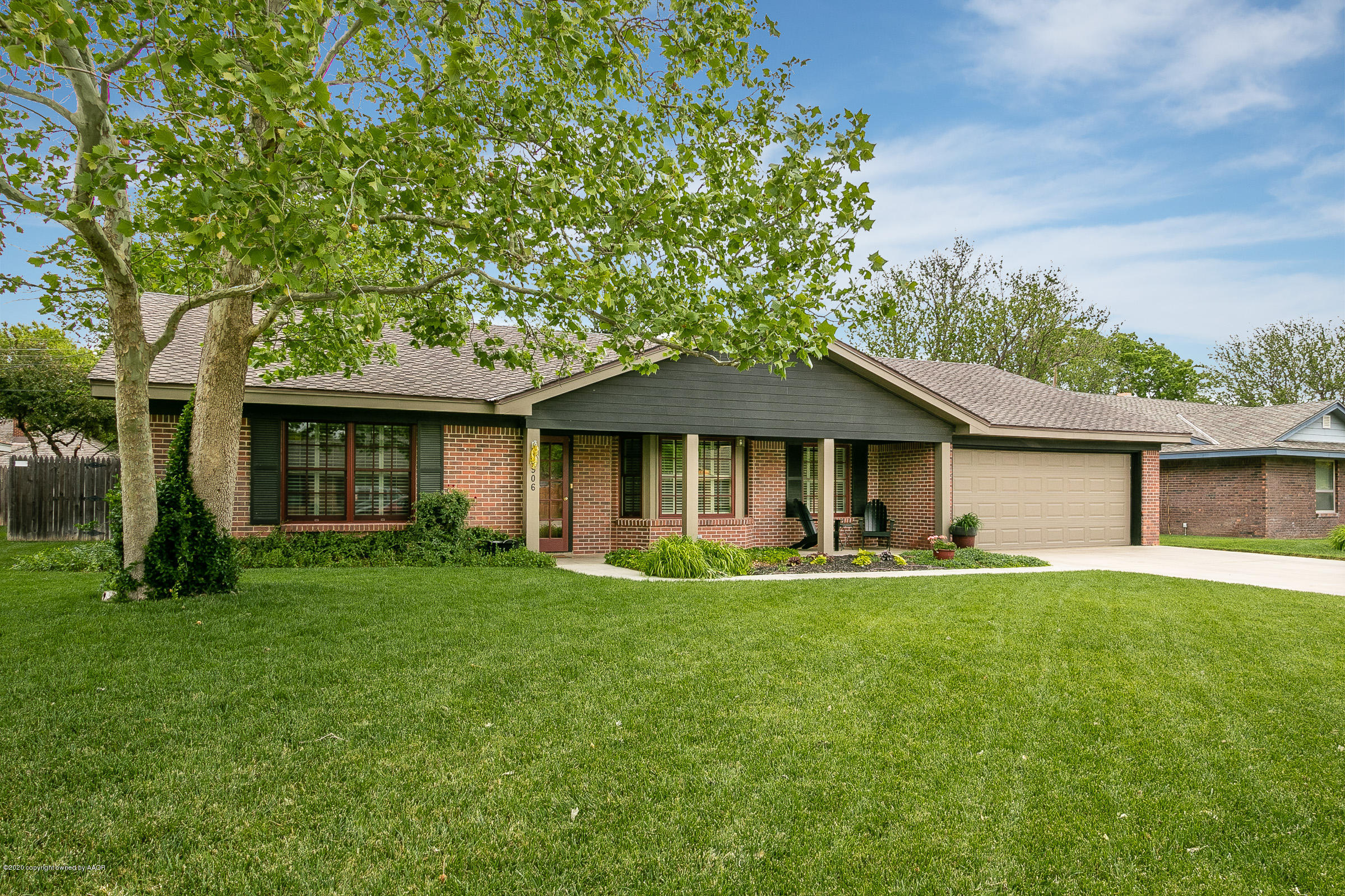 6906 Elmhurst Road Amarillo, TX 79106 - Photo 1 of 33 front view of a house with a yard