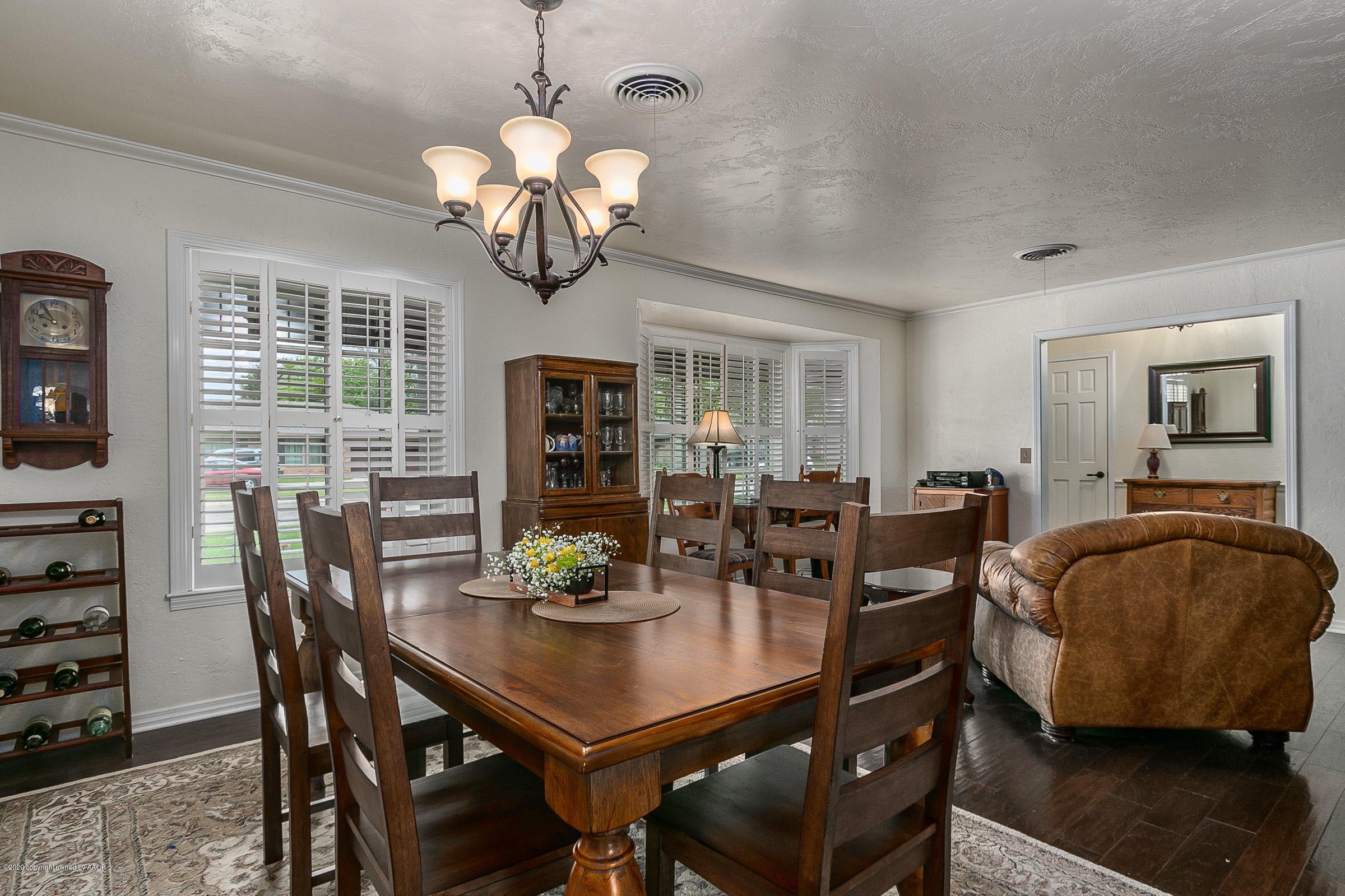 6906 Elmhurst Road Amarillo, TX 79106 - Photo 5 of 33 a view of a dining room with furniture window and outside view