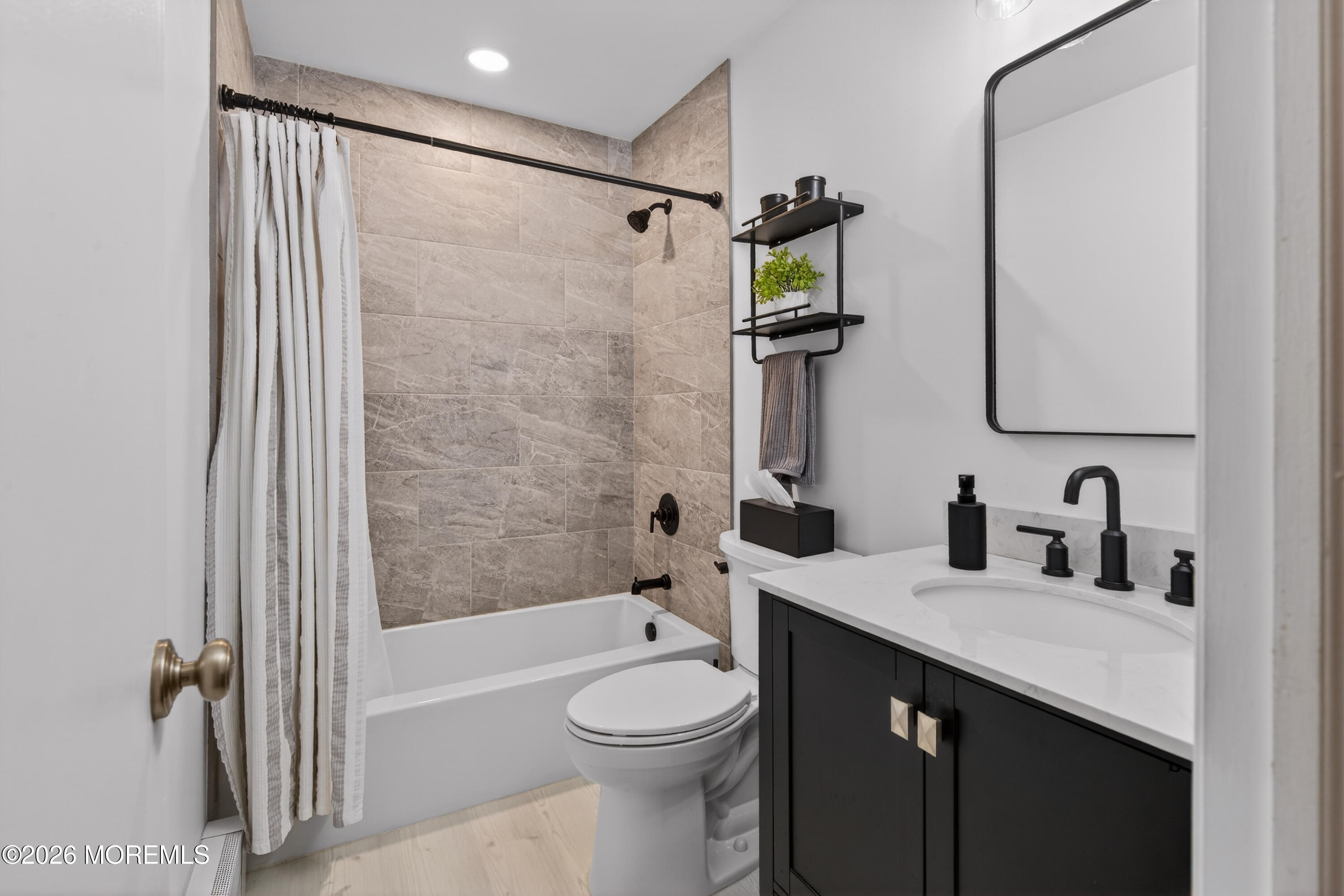 330 Highway 35, Unit 20 Point Pleasant Beach, NJ 08742 - Photo 17 of 22 a bathroom with a sink a toilet and shower