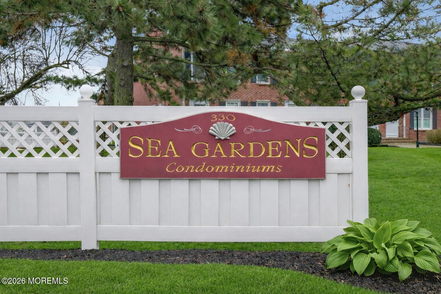 330 Highway 35, Unit 20 Point Pleasant Beach, NJ 08742 - Photo 2 of 22 a sign on the side of the road