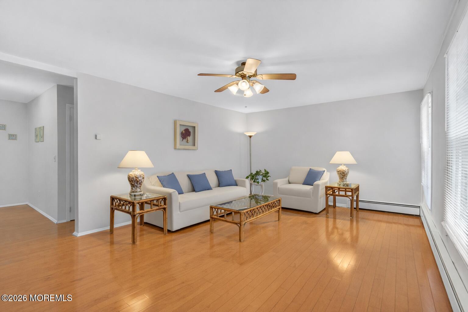 330 Highway 35, Unit 20 Point Pleasant Beach, NJ 08742 - Photo 5 of 22 a living room with furniture and a lamp
