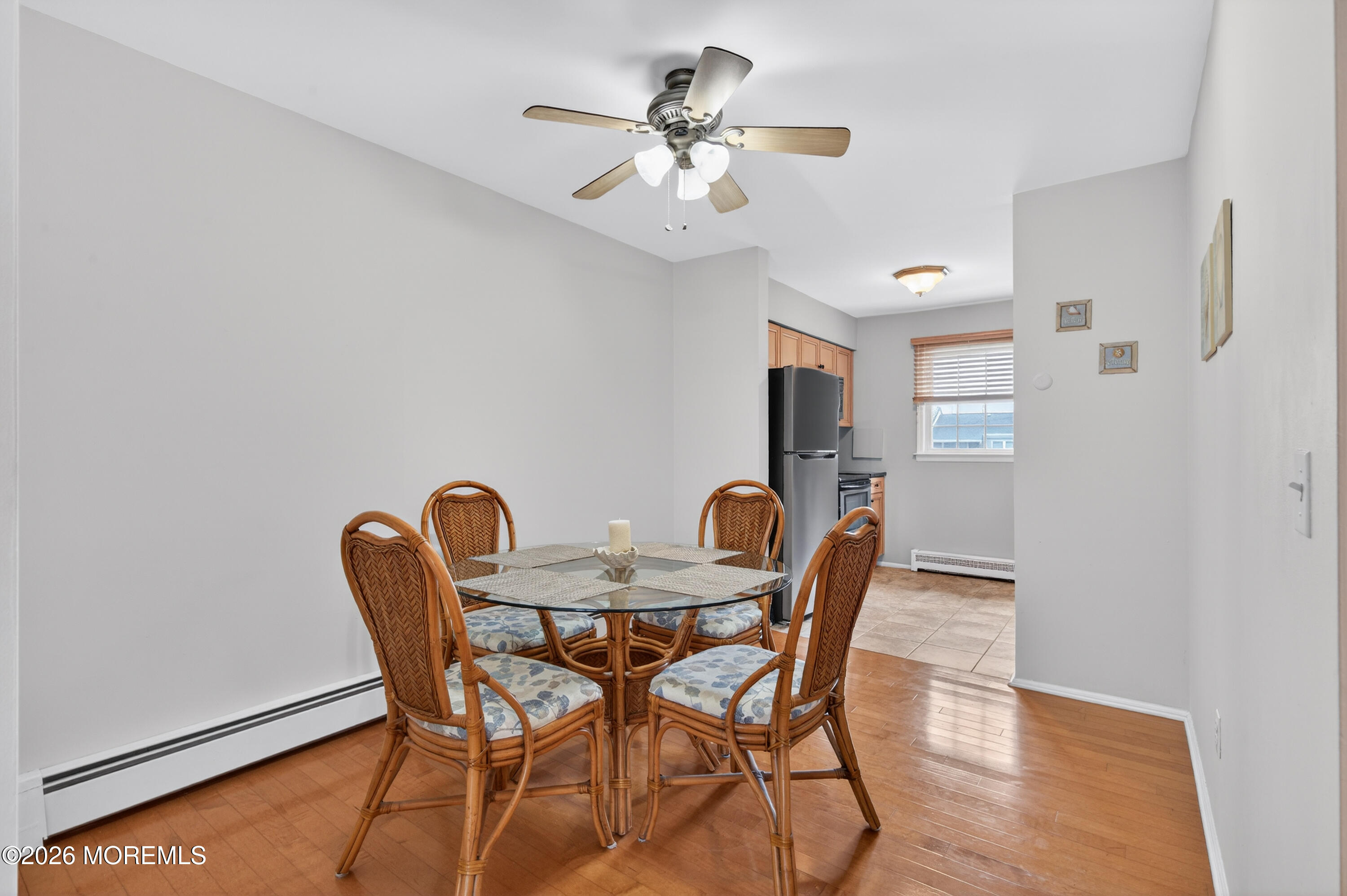 330 Highway 35, Unit 20 Point Pleasant Beach, NJ 08742 - Photo 7 of 22 a view of a dining room with furniture and chandelier
