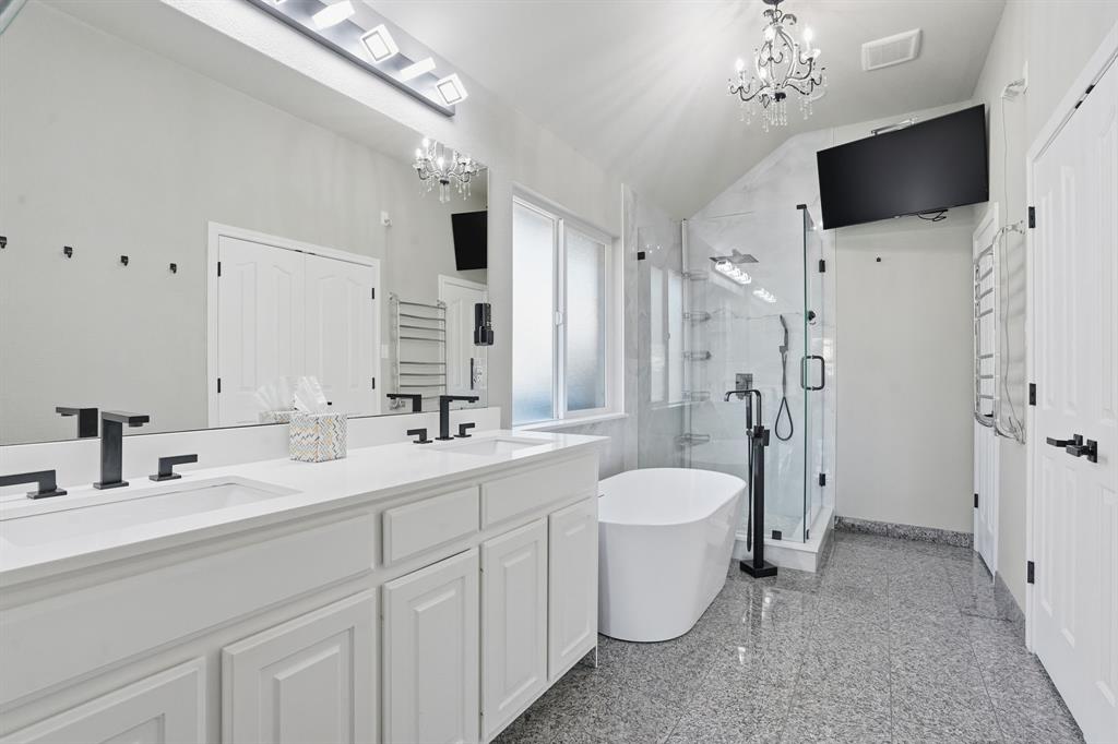 12701 Beech Tree Lane Fort Worth, TX 76040 - Photo 13 of 33 a bathroom with a toilet sink and mirror