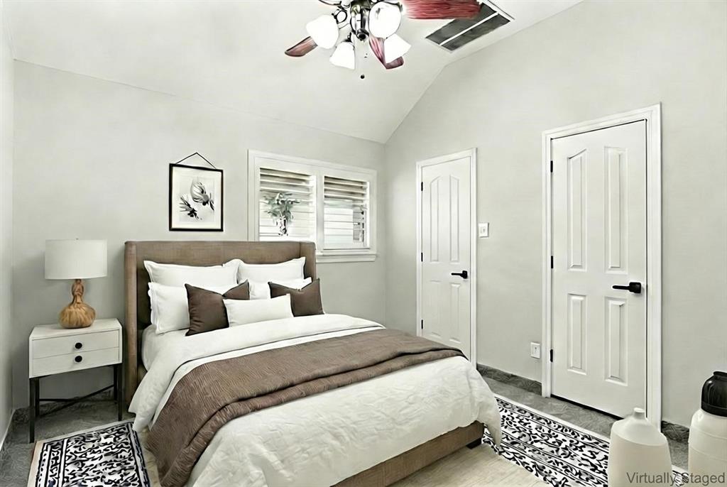 12701 Beech Tree Lane Fort Worth, TX 76040 - Photo 16 of 33 a bedroom with a bed and a chandelier