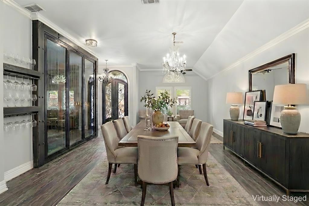 12701 Beech Tree Lane Fort Worth, TX 76040 - Photo 10 of 33 a dining room with furniture a chandelier and wooden floor