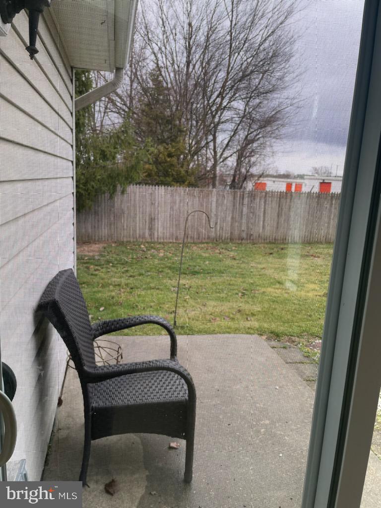 28 Palmer Square Beverly, NJ 08010 - Photo 3 of 12 a view of a wooden bench sitting in backyard