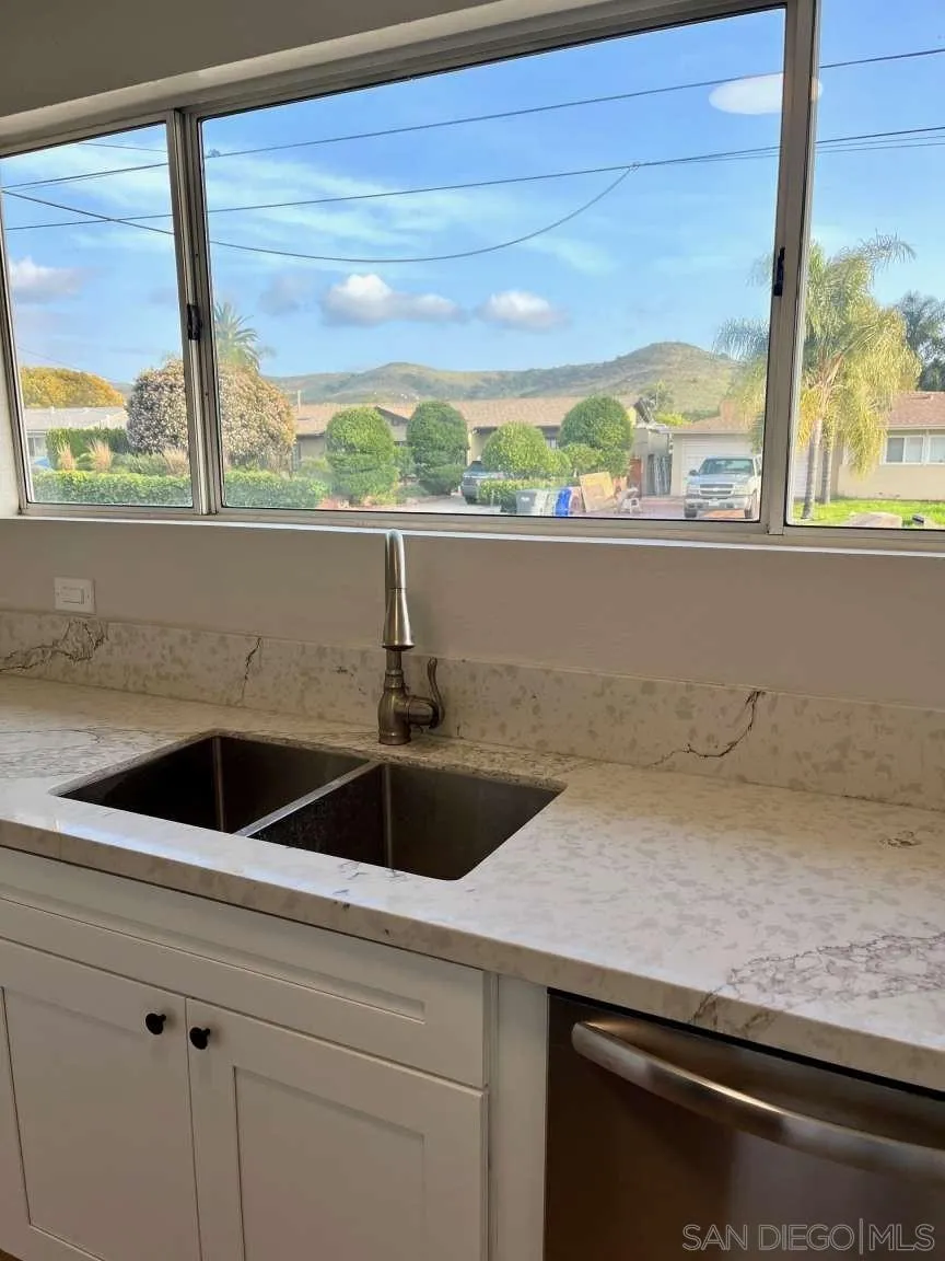 14538 Biddeford Street Poway, CA 92064 - Photo 3 of 26 a view closed with a granite countertop sink