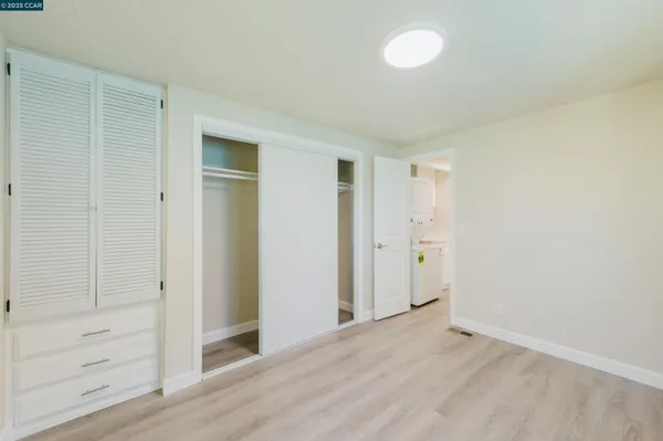 a bathroom with a sink vanity and a mirror