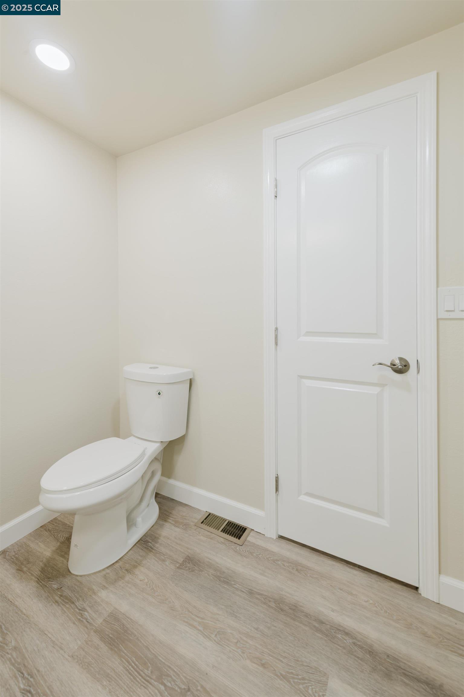 2990 San Pablo Dam Road, Unit 2 San Pablo, CA 94803 - Photo 19 of 41 a white toilet sitting next to a bathroom sink
