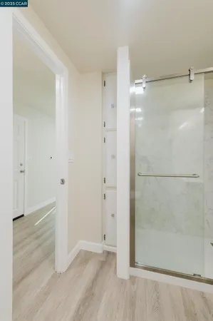 a view of a refrigerator in a kitchen