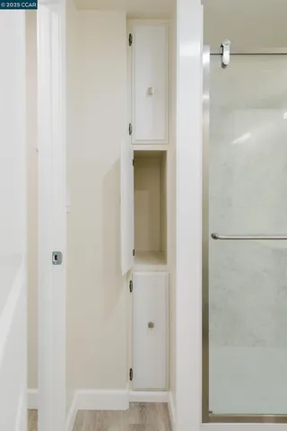 a view of a bathroom with a glass door