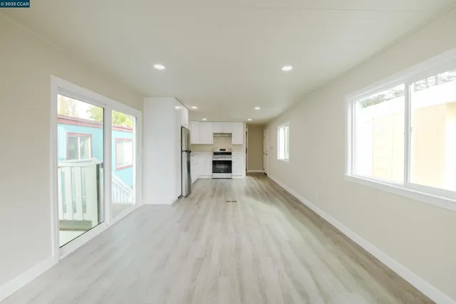 an empty room with windows