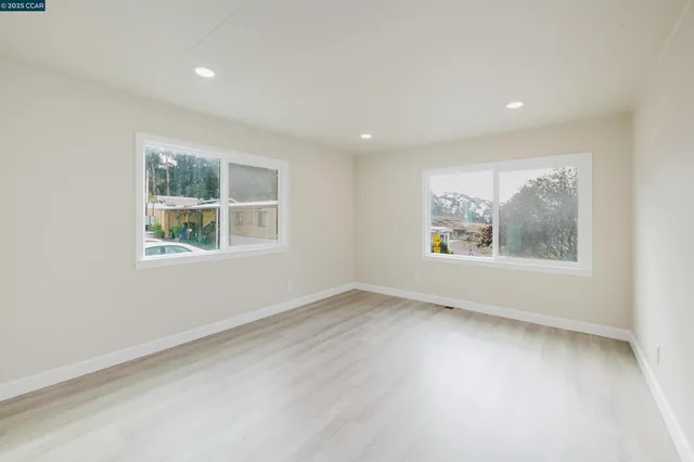 an empty room with windows